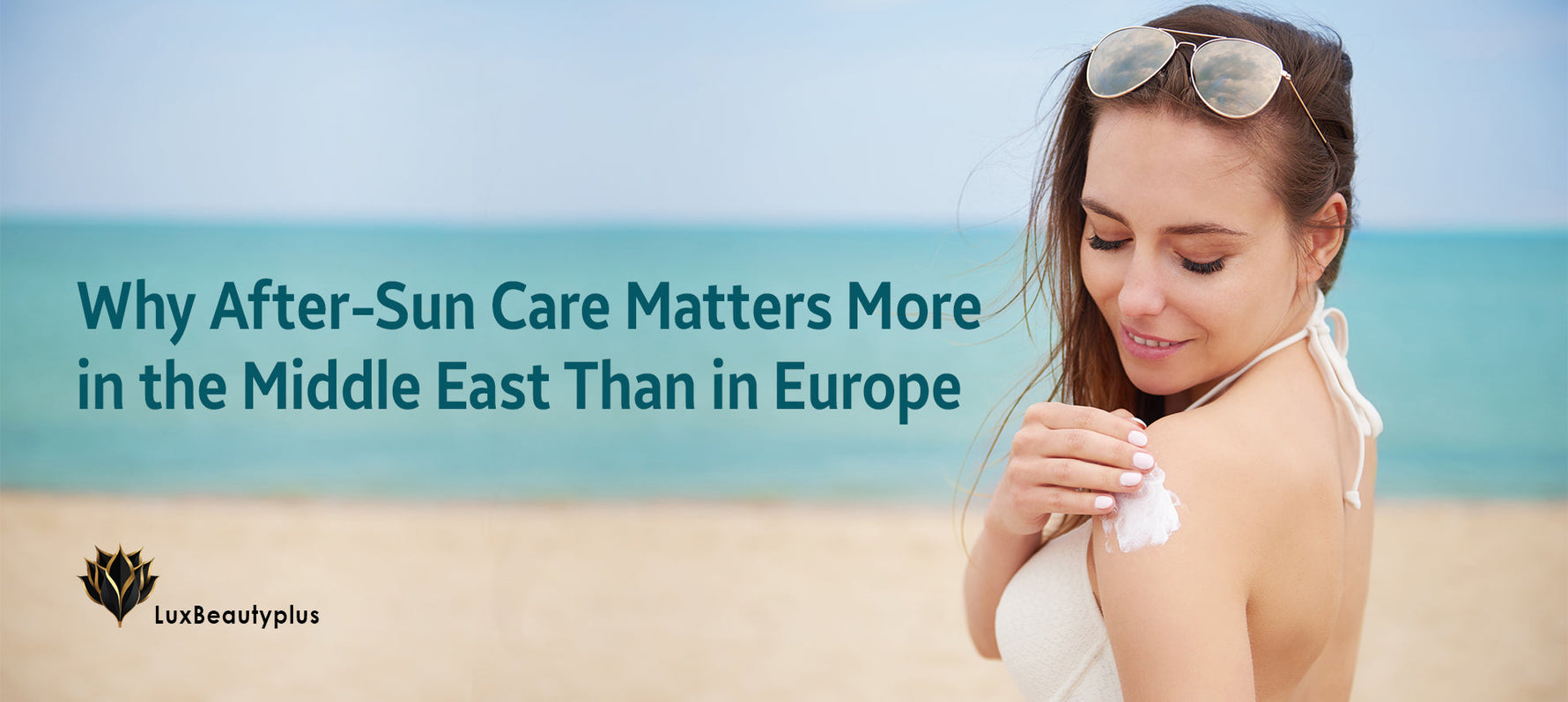 A woman on a sunny beach applies soothing after-sun lotion to her shoulder, highlighting the importance of skin hydration and recovery after sun exposure. The LuxBeautyPlus logo appears in the corner.