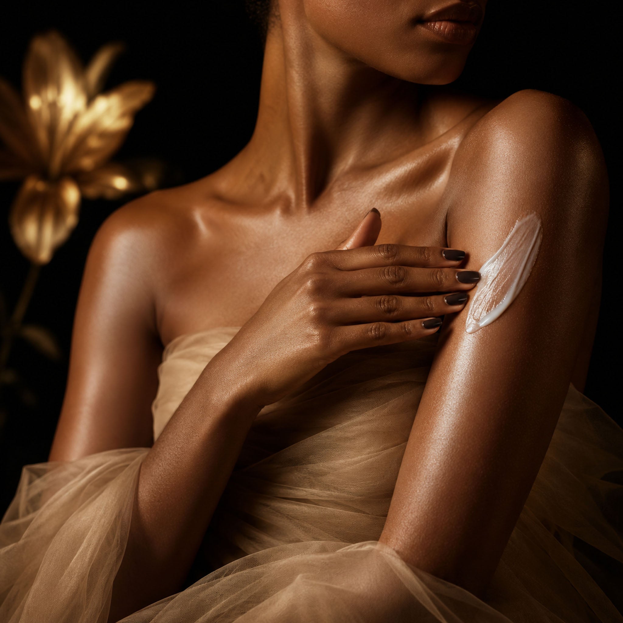 Luxury body care scene featuring a woman applying moisturizing cream to her arm against an elegant black and gold floral background.luxplus